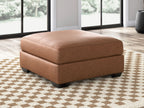Oversized accent ottoman in light brown upholstered finish with square top