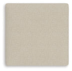 Light beige square ottoman cushion with smooth twill-like fabric texture
