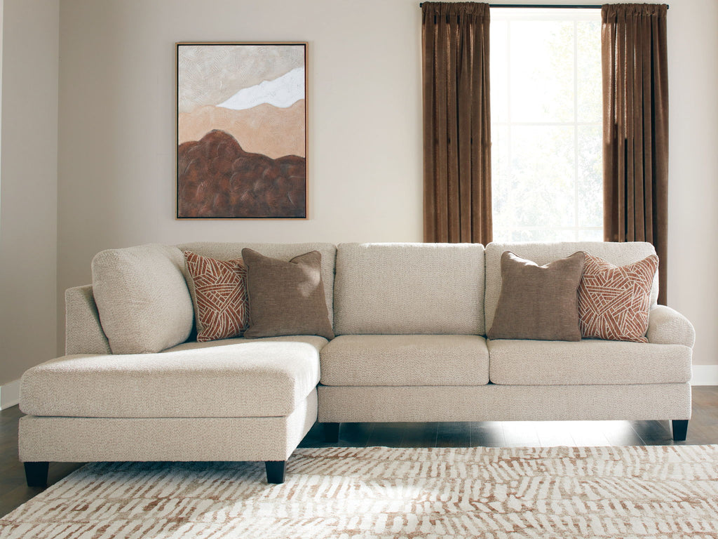 Light beige sectional sofa with left corner chaise, dark legs, 5 accent pillows