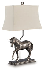 Bronze horse table lamp with off-white fabric shade and square pedestal base.