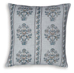 Patterned throw pillow in dark gray with blue floral damask panels and stitched edges