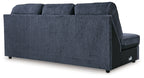 Sofa chaise sectional in dark cobalt fabric, armless back panel and visible seat cushion