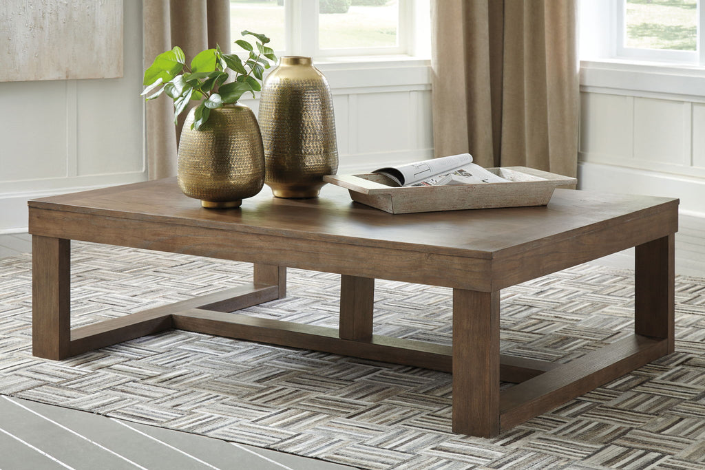 Gray rectangular cocktail table with open shelf, solid legs, and smooth top