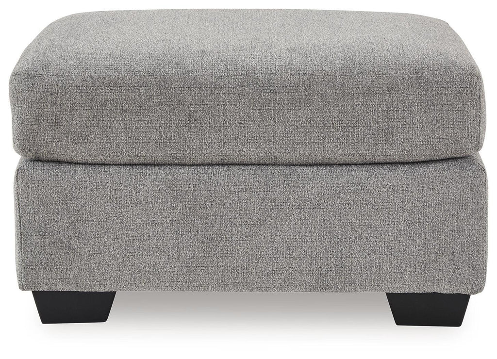 Gray fabric ottoman with padded top and dark legs