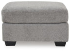 Gray fabric ottoman with padded top and dark legs