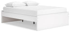 White platform bed with upholstered headboard and open under-bed storage