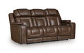 Brown leather power recline sofa with adjustable headrests and tufted seat cushions