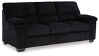 Black upholstered sofa with tufted back, cushioned armrests, and square legs.