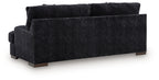 Dark fabric sofa with square arms and tufted seat cushions