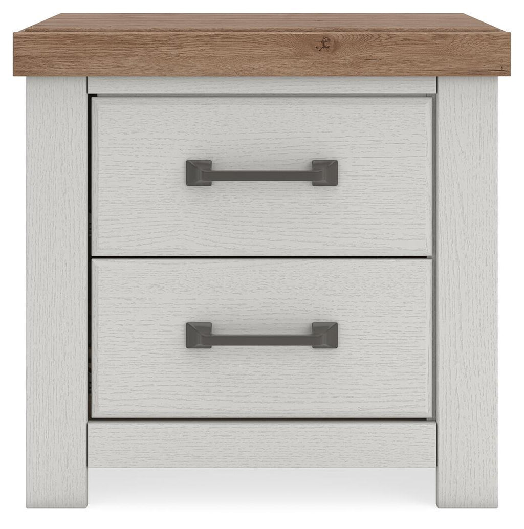 Two-drawer night stand in white with brown tabletop and two dark metal bar handles.