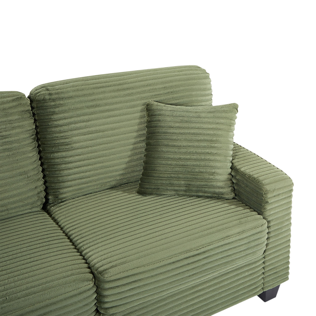 Green corduroy sectional sofa with side armrest and ribbed seat cushion