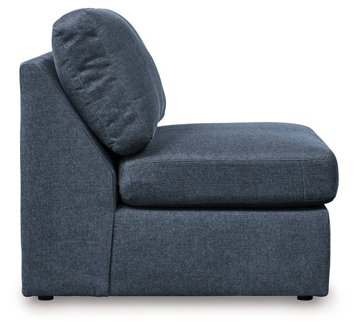 Ink blue armless accent chair with curved backrest and thick seat cushion