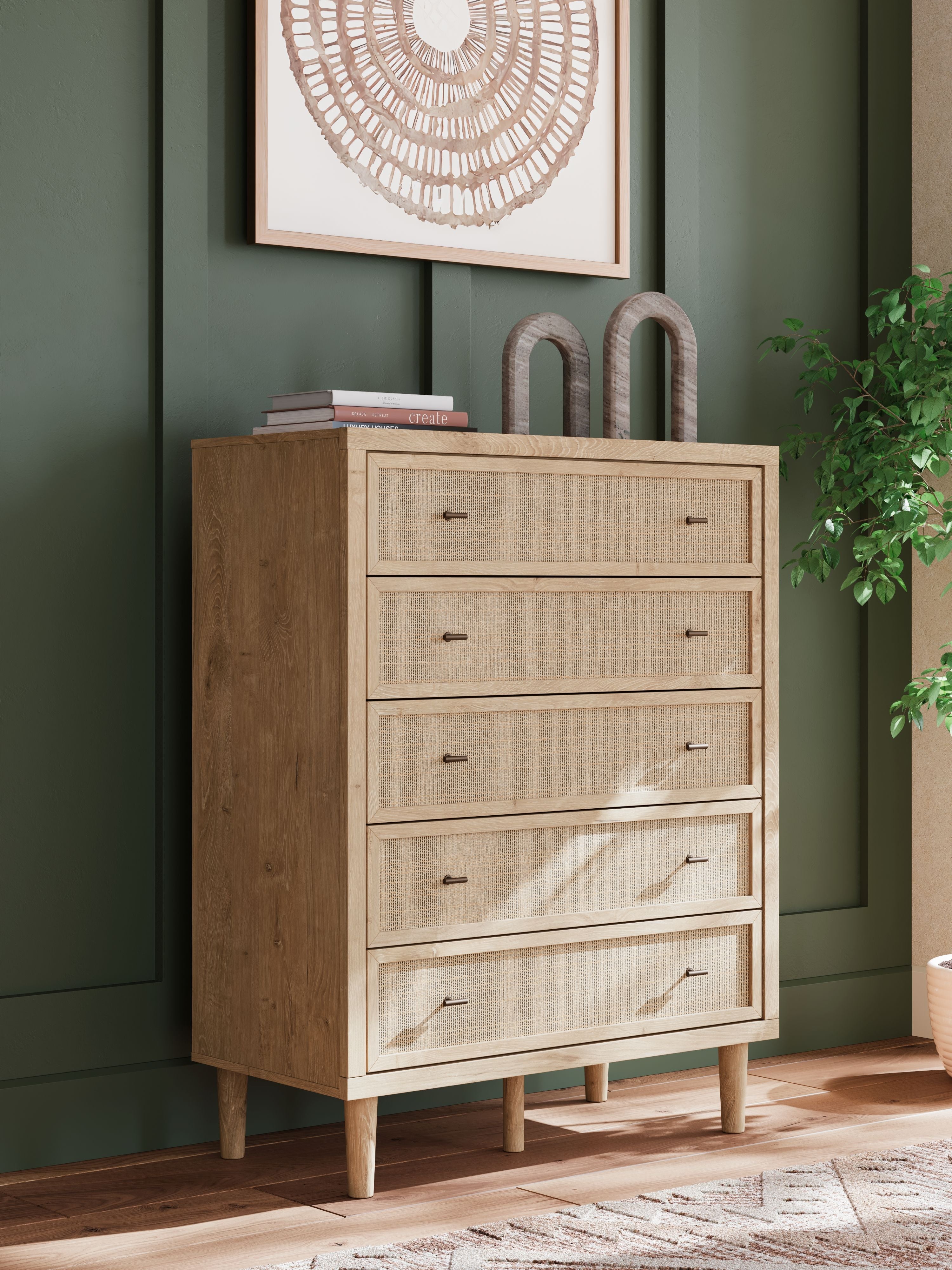 Five-drawer wide chest with woven light fronts, dark handles, angled side panel
