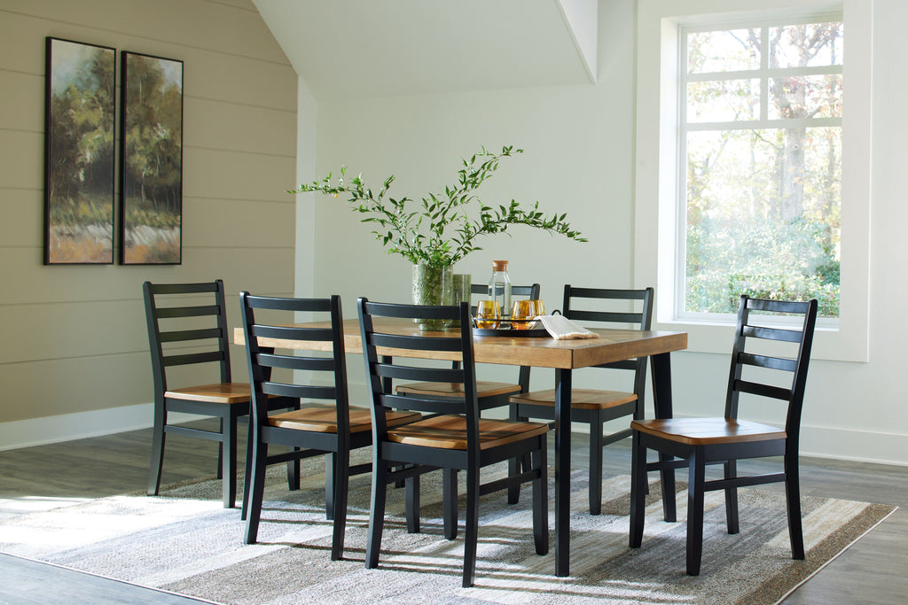 Rectangular dining table with brown top and black slat-back chairs
