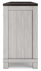 Gray cabinet panel end of TV stand with dark top and base trim