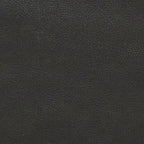 Close-up of dark textured upholstery fabric on a sofa cushion