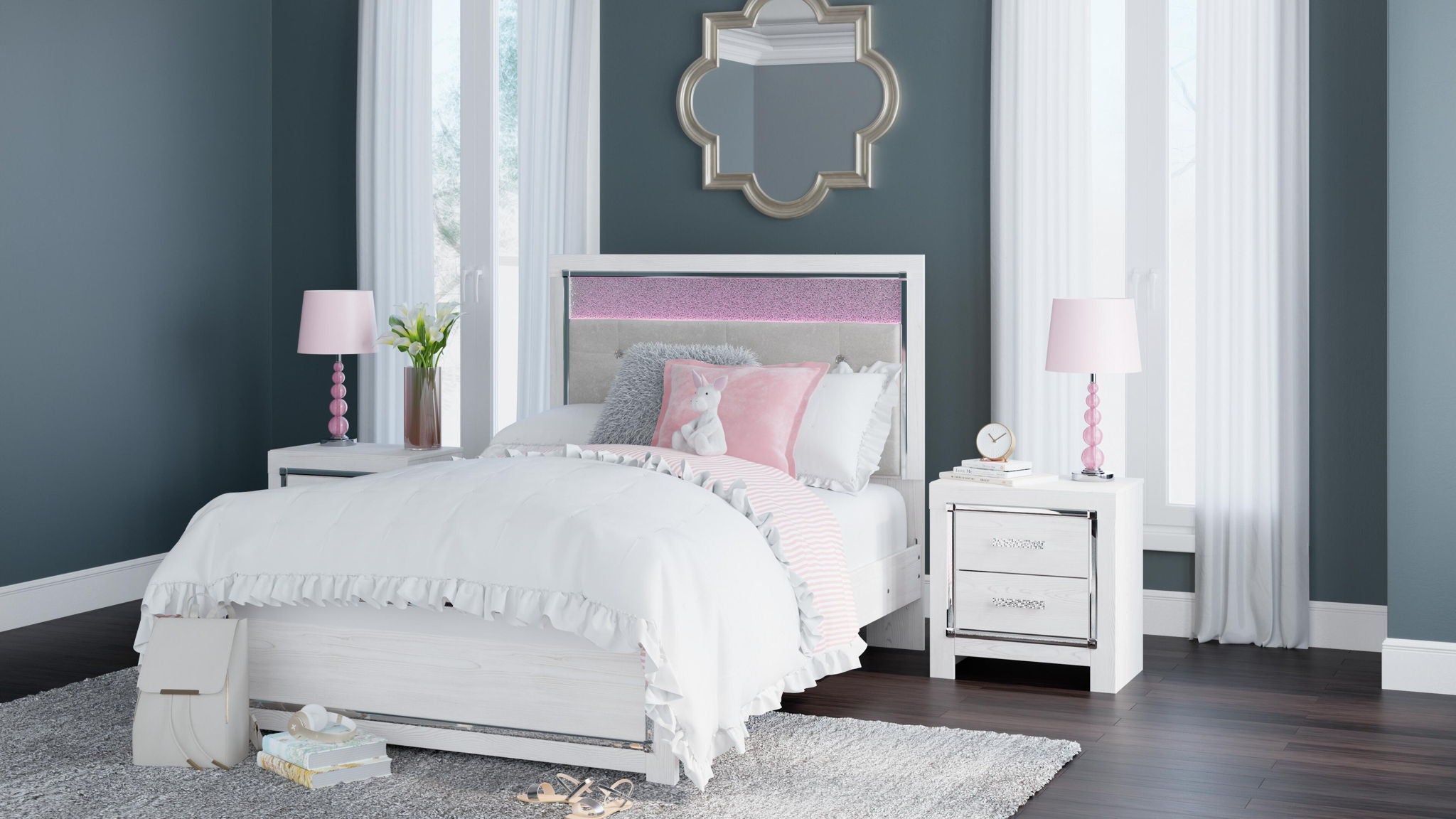 White panel bed with paneled headboard, footboard, and dressed bedding