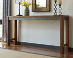 Dark brown long counter table with lower shelf and side cross braces.
