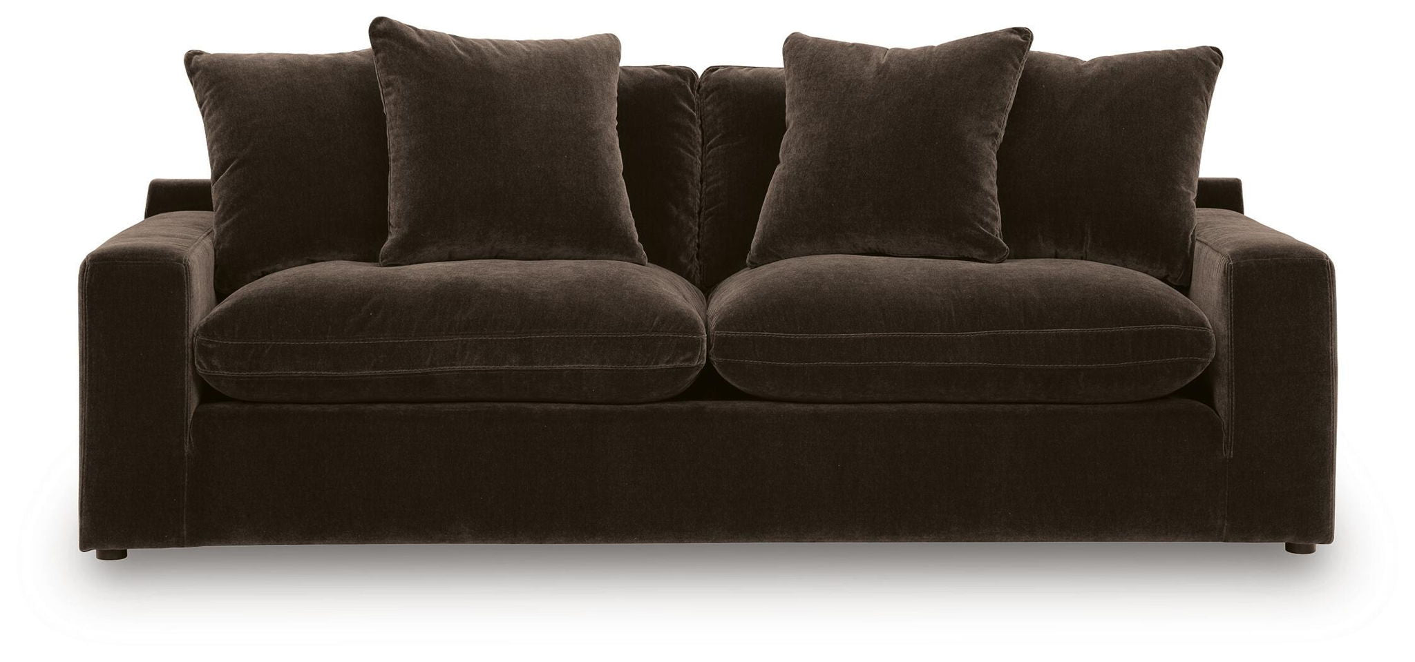 Dark brown fabric sofa with two large seat cushions and four back pillows, low base