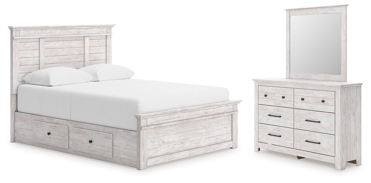 White wood storage bed with drawer front and matching dresser with mirror