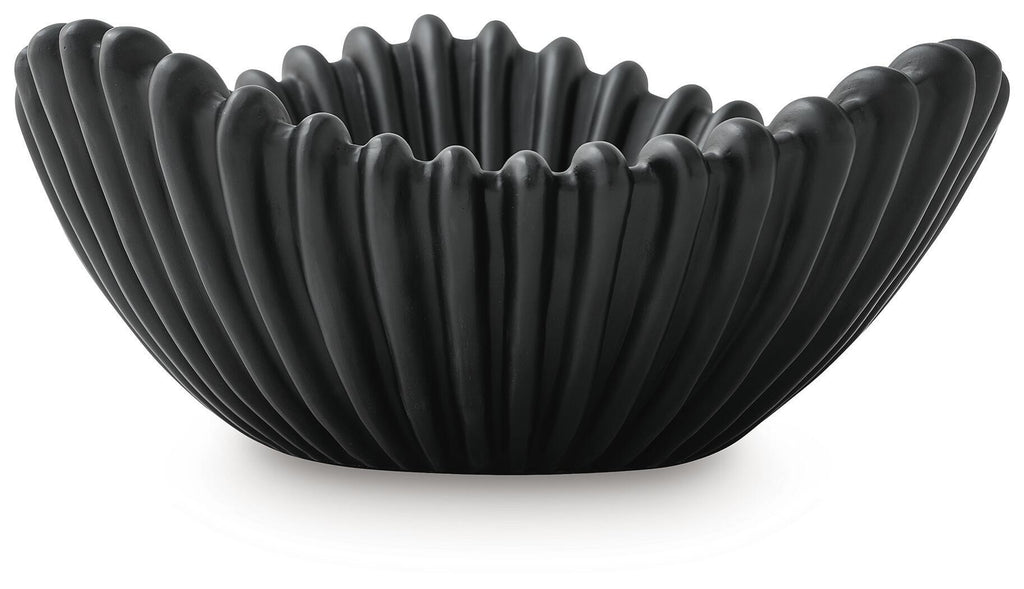 Black fluted bowl with ribbed ridges and scalloped rim