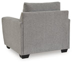 Gray upholstered armchair with square arms and cushioned back