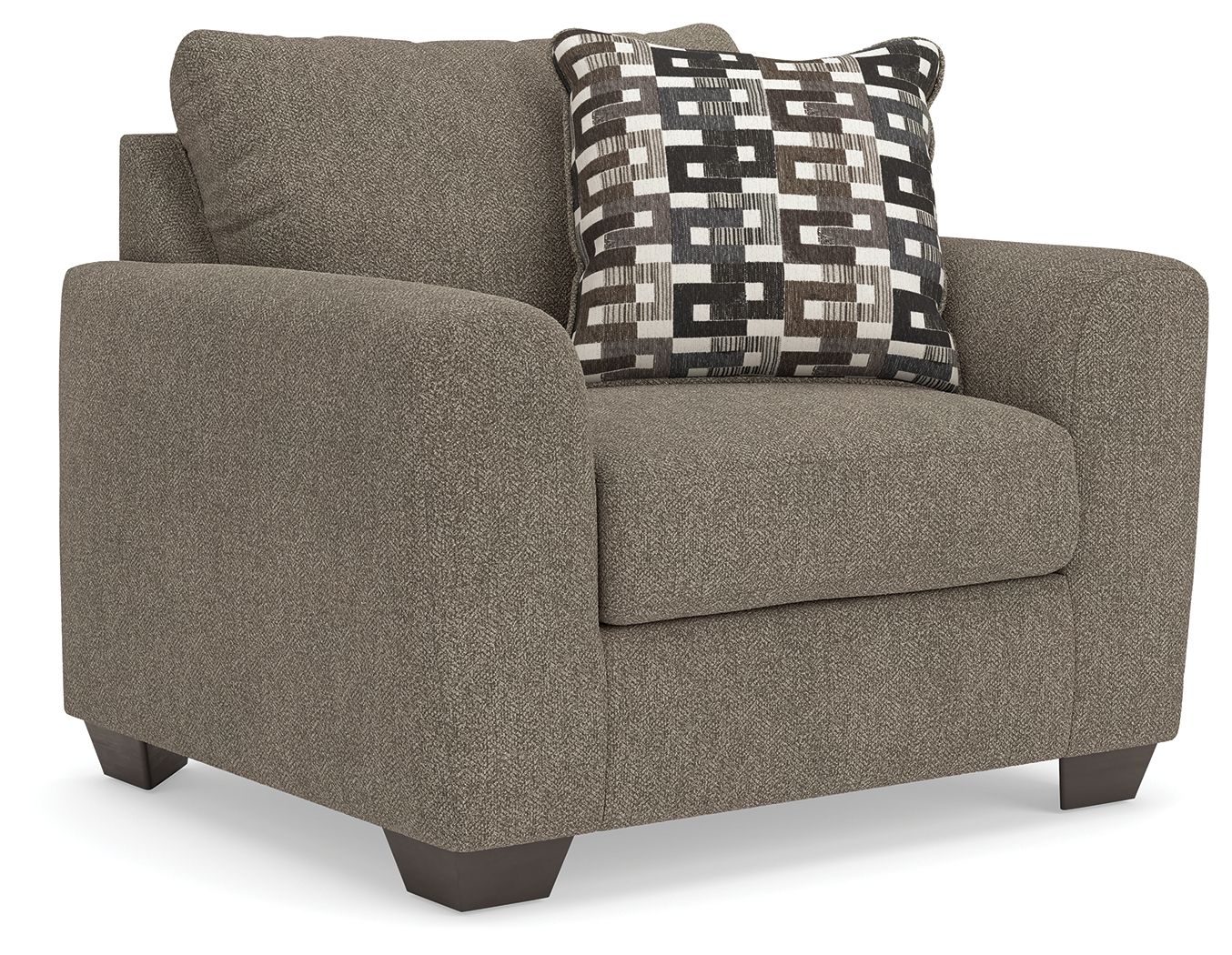 Upholstered chair and a half in dark gray with geometric patterned throw pillow