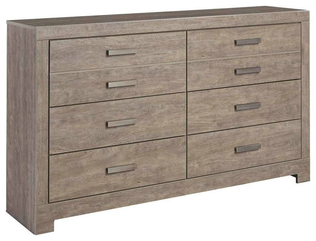 Gray wood dresser with six drawers and metal bar pull handles