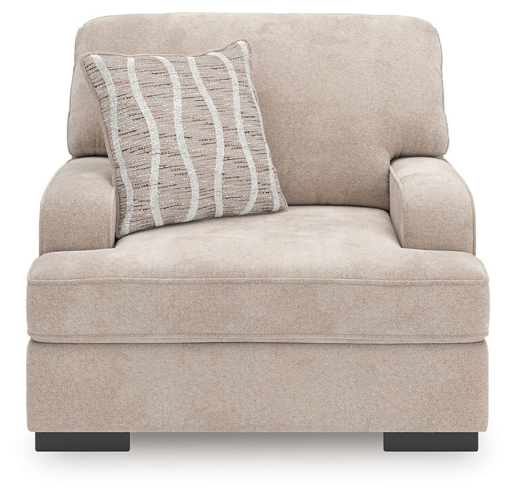 Taupe upholstered chair and a half with striped accent pillow, front view, dark legs