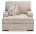 Taupe upholstered chair and a half with striped accent pillow, front view, dark legs