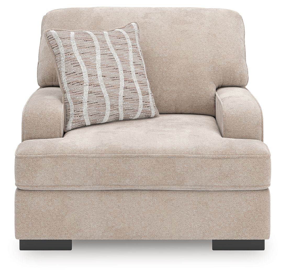 Taupe upholstered chair and a half with striped accent pillow, front view, dark legs