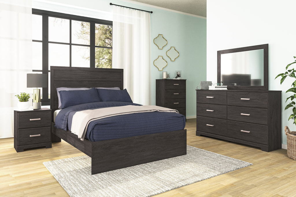 Charcoal dresser with mirror in bedroom, six drawers and metal bar pulls