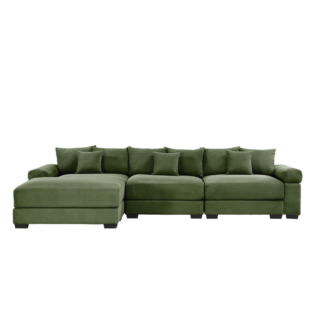 Green sectional sofa with left ottoman chaise, deep seat cushions, and back pillows