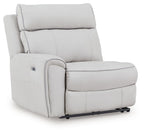 Light gray power recliner with padded headrest and track-style arms