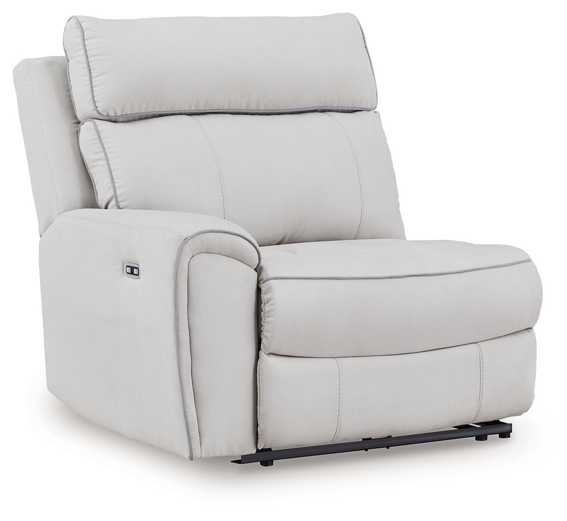 Light gray power recliner with padded headrest and track-style arms
