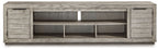 Gray TV console with open center shelves and two side cabinet doors