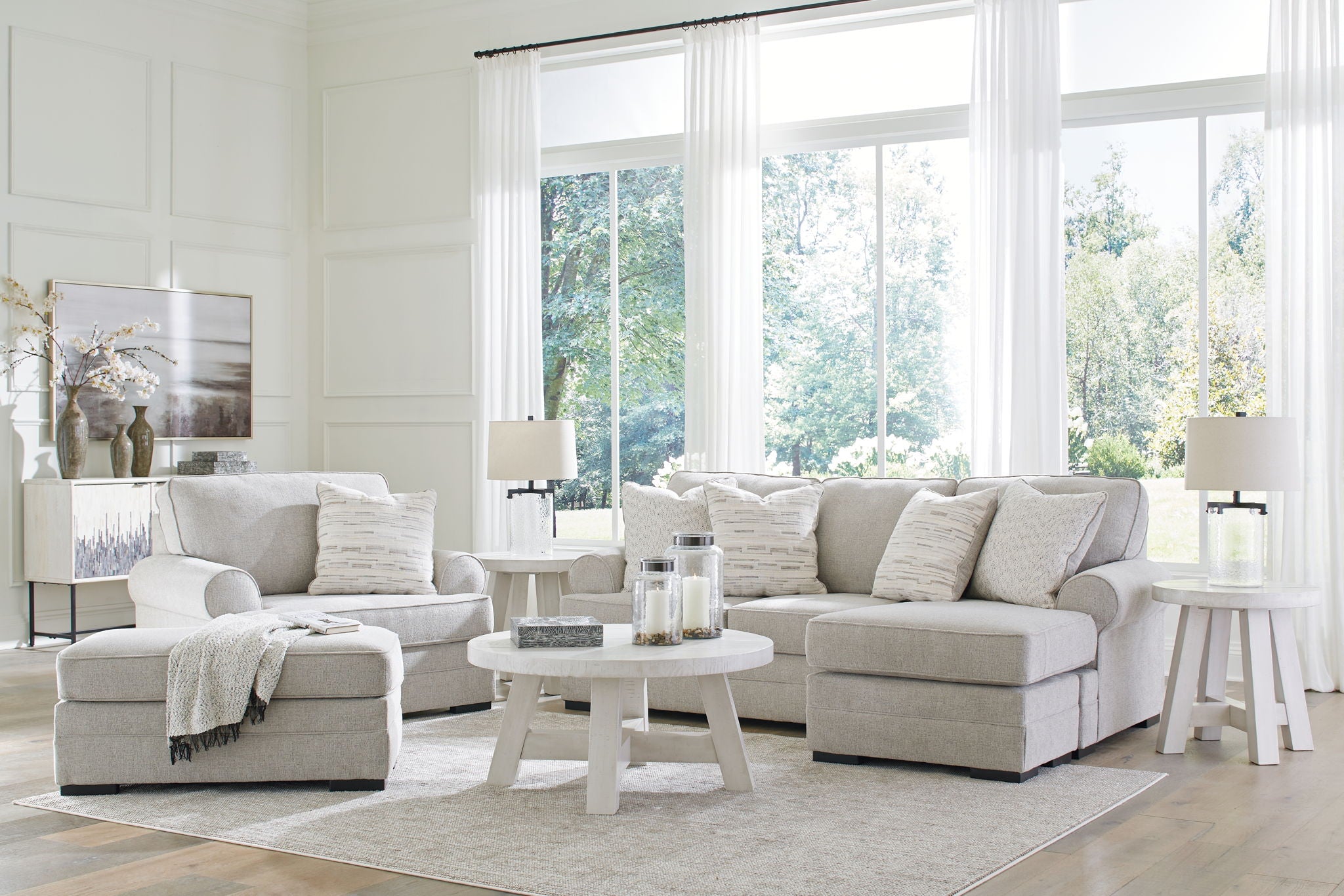 Gray sectional sofa set with chaise and coordinating pillows