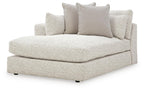 Corner chaise sofa with three seat/back cushions and two throw pillows, light upholstery