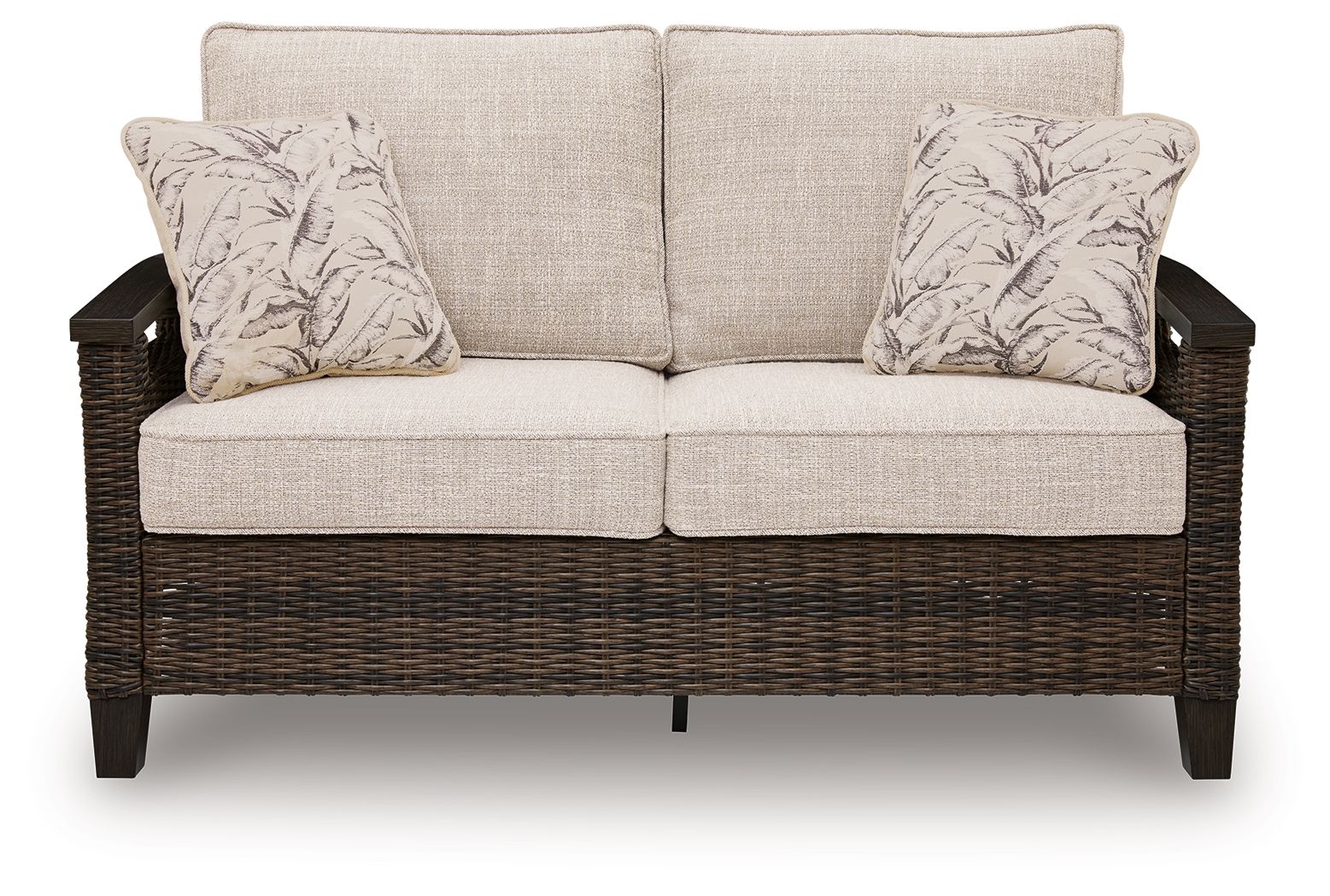Dark brown wicker loveseat with two seat cushions and two patterned pillows