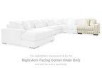 Ivory sectional corner chair section with ribbed upholstery and right-facing arm