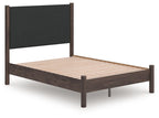Dark brown platform bed frame with dark headboard and slatted support deck