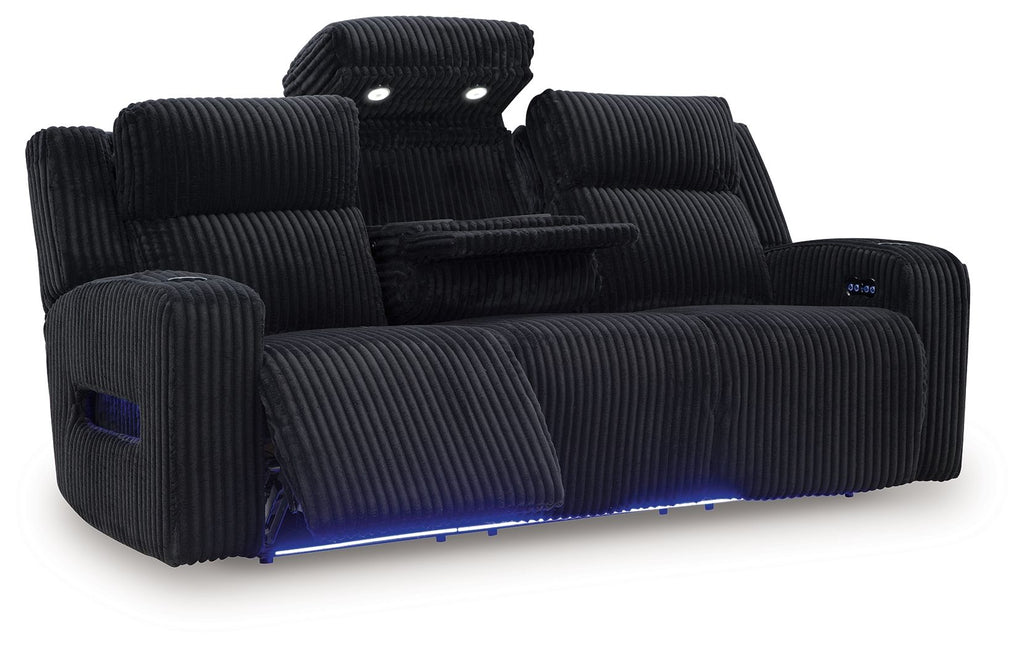 Power reclining sofa with adjustable headrests, black ribbed upholstery, raised headrests