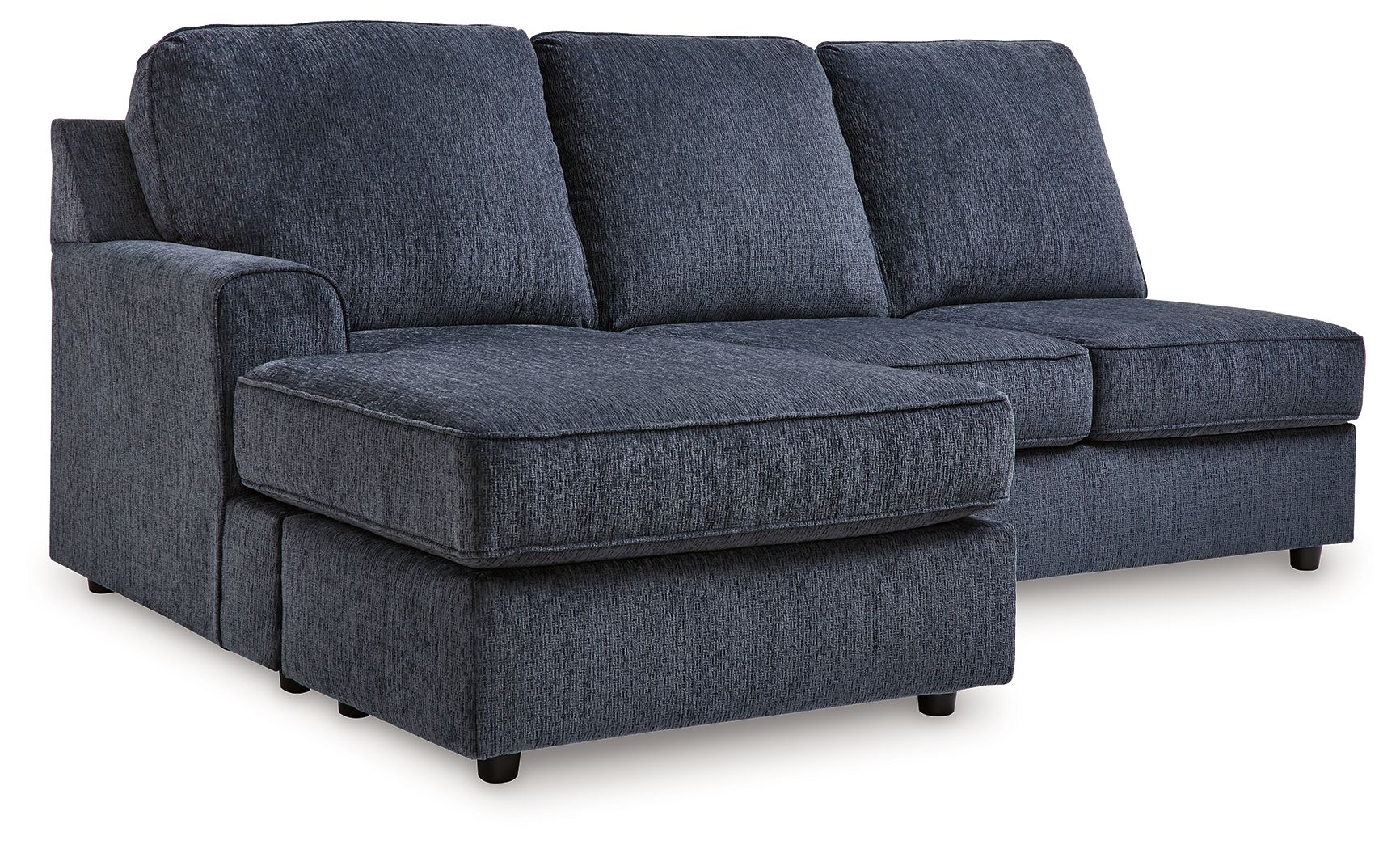 Cobalt blue upholstered sectional with chaise ottoman and three back cushions