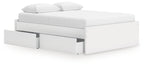 White platform bed with padded headboard and visible storage drawers