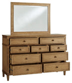 Light brown dresser with mirror, nine drawers with round metal knobs