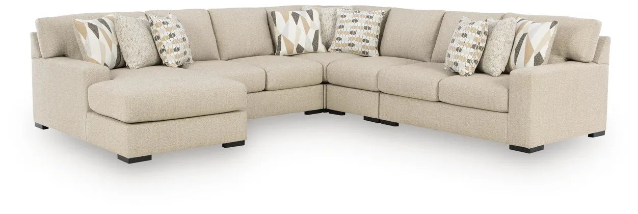 Laurelgrove sectional sofa in pebble fabric with open corner and multiple accent throw pillows