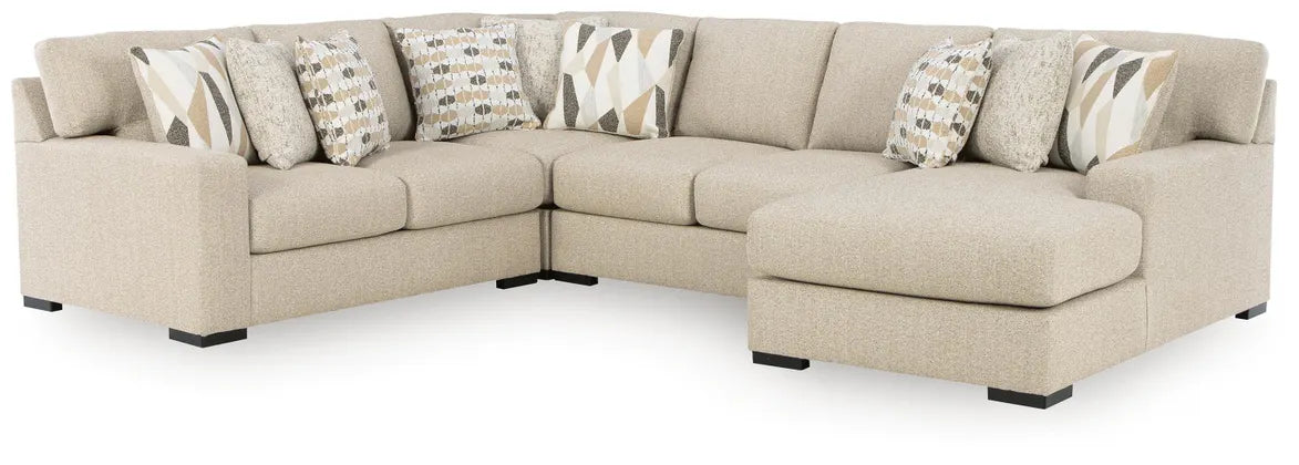 Laurelgrove sectional sofa in pebble fabric with corner chaise and patterned accent pillows