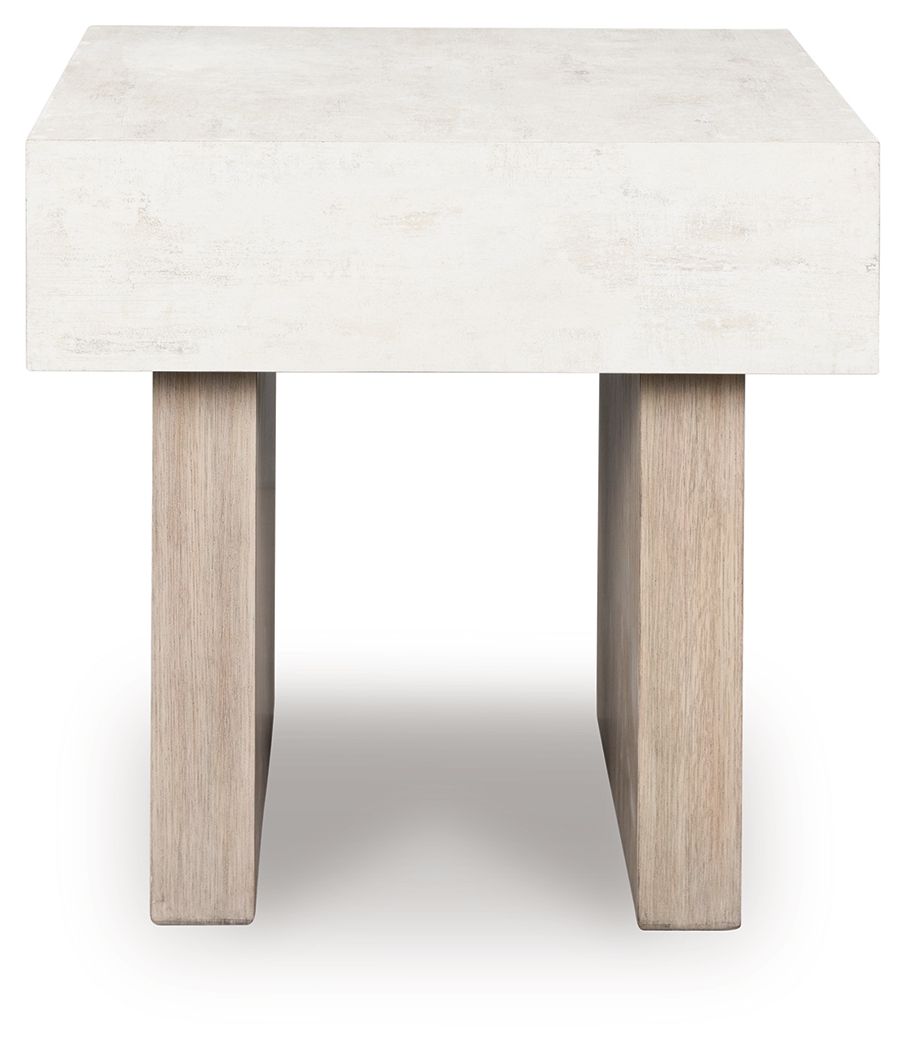 Jorlaina rectangular table front view with whitewashed tabletop and two visible wooden legs