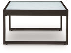 Square cocktail table with open lower shelf and light gray marble-style top
