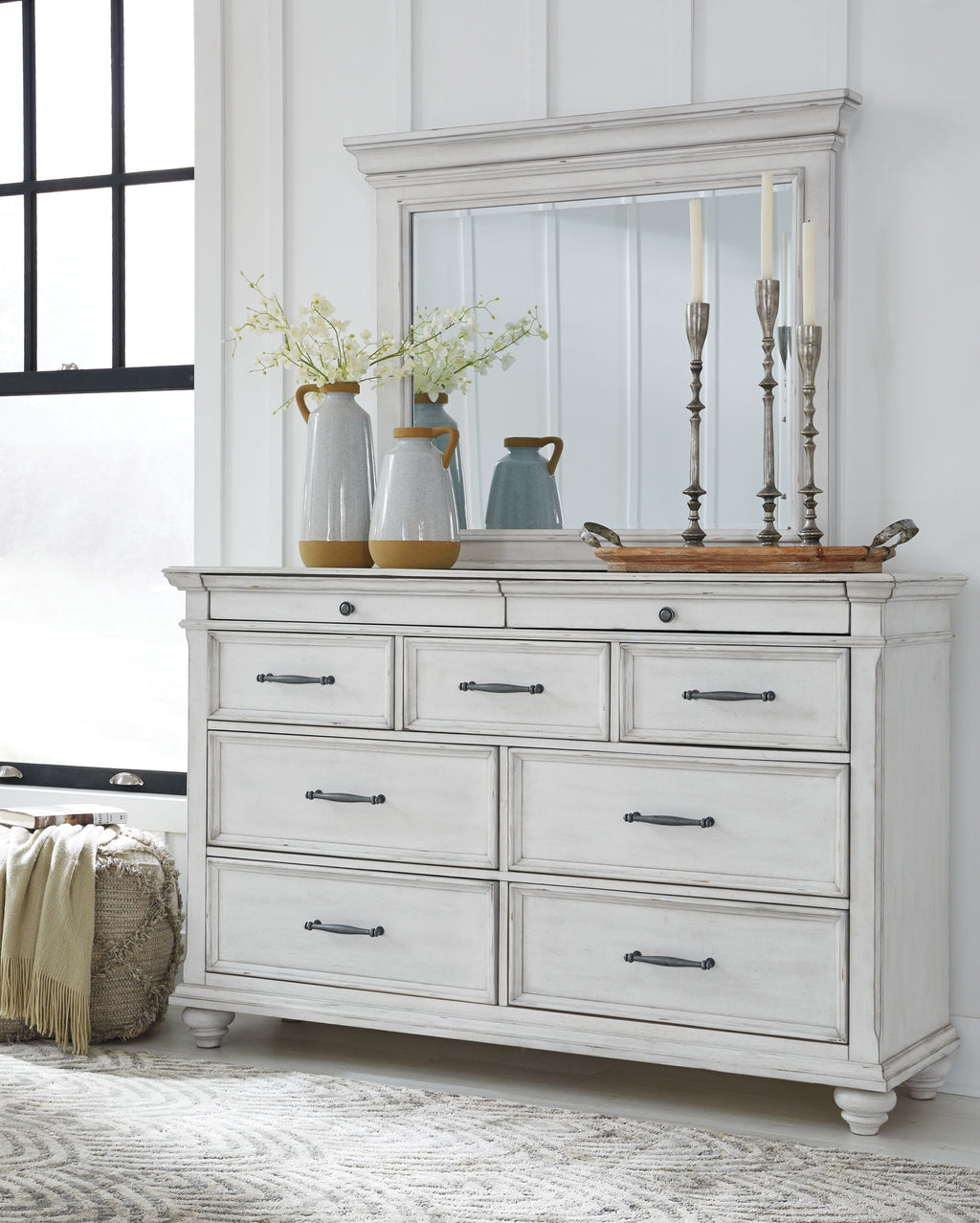 White dresser with mirror and drawer fronts, metal bar pulls
